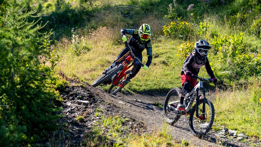 Young downhill bikers in the Verbier Bikepark